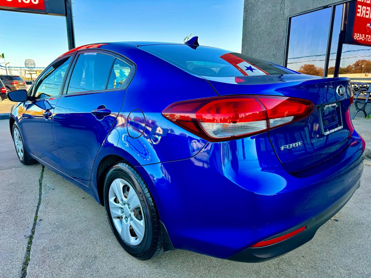 2018 BLUE KIA FORTE LX (3KPFK4A74JE) , located at 5900 E. Lancaster Ave., Fort Worth, TX, 76112, (817) 457-5456, 0.000000, 0.000000 - This is a 2018 KIA FORTE LX 4 DOOR SEDAN that is in excellent condition. There are no dents or scratches. The interior is clean with no rips or tears or stains. All power windows, door locks and seats. Ice cold AC for those hot Texas summer days. It is equipped with a CD player, AM/FM radio, AUX por - Photo#4